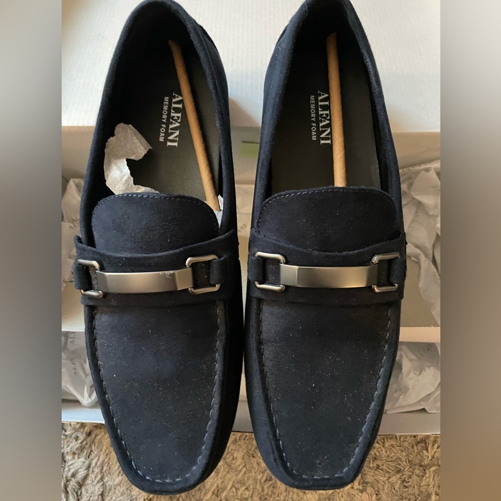 Suede navy blue loafers.